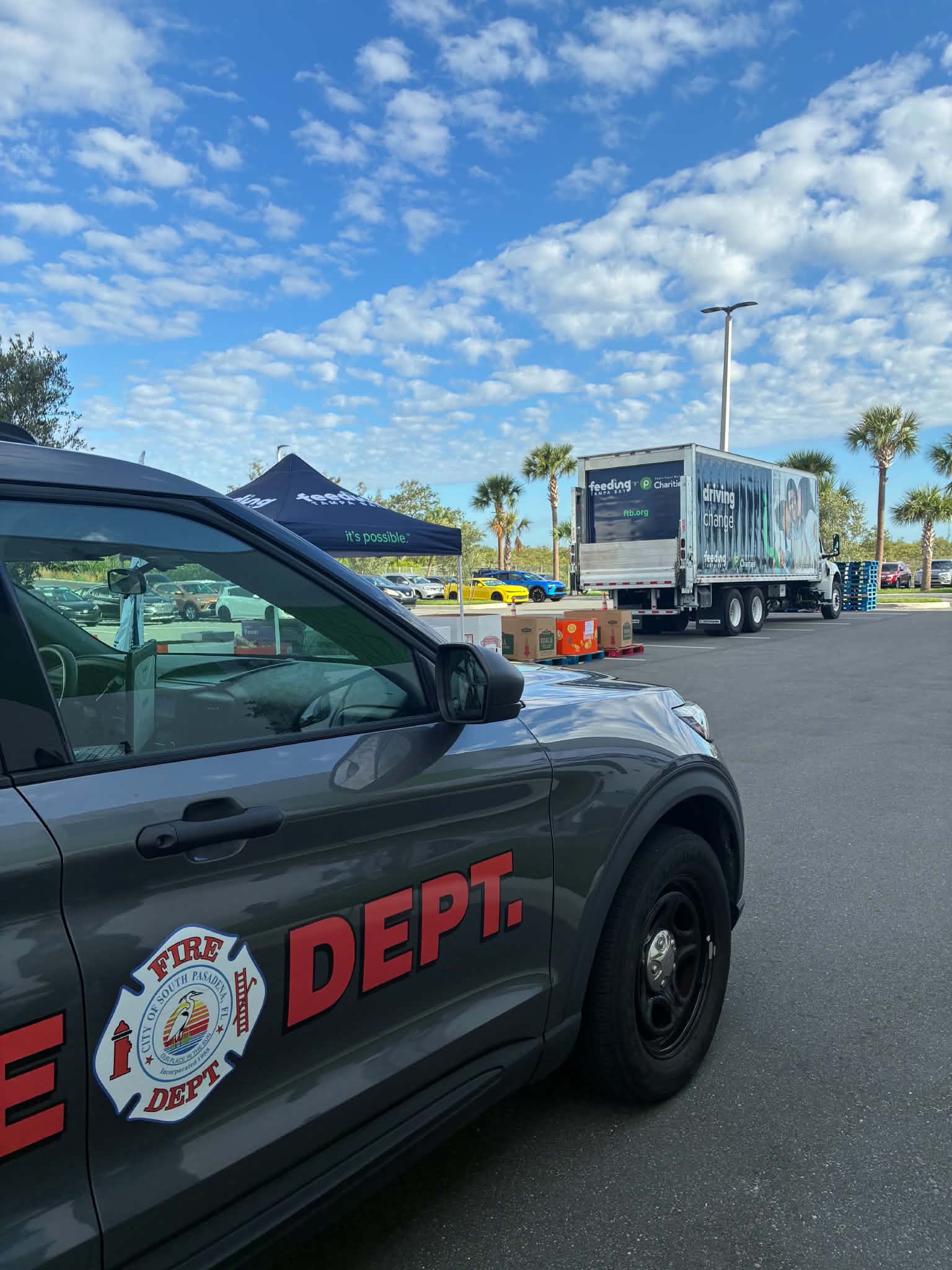 SUV parked outside of Feeding Tampa Bay Donation Center